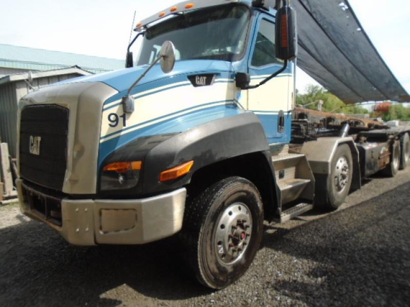 Roll-off truck Caterpillar CT660 2012 For Sale at EquipMtl