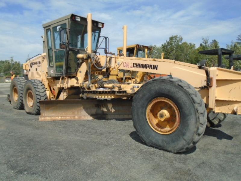 Niveleuse equip. Champion 750A-VHP 1998 En Vente chez EquipMtl